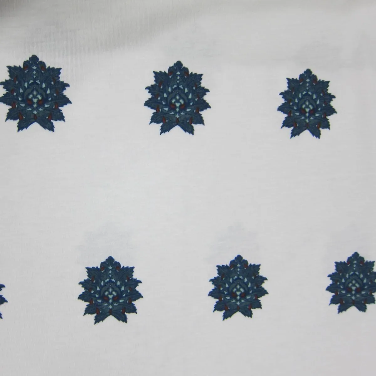Crest on White Cotton Jersey Fabric
